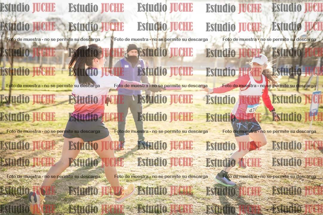 Fotos en el tercer relevo (3000 m de carrera)