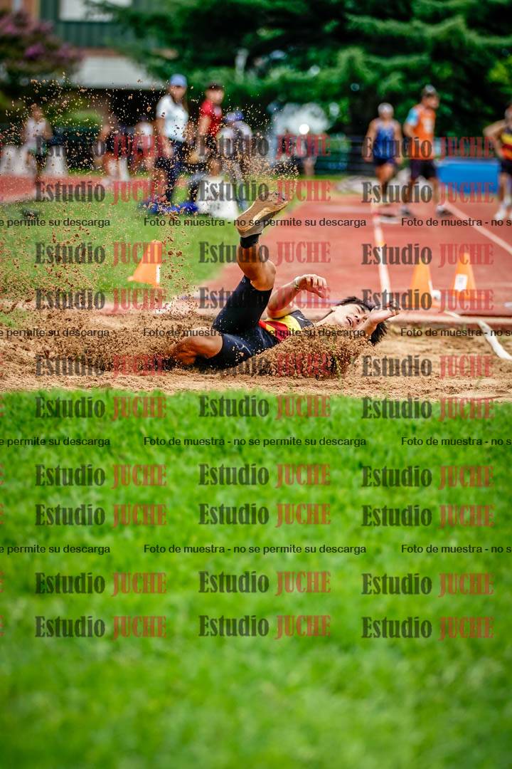 Fotos del salto en largo de varones