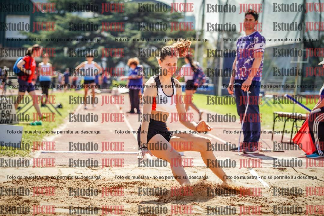 Fotos del salto en largo de mujeres - ambas categorías