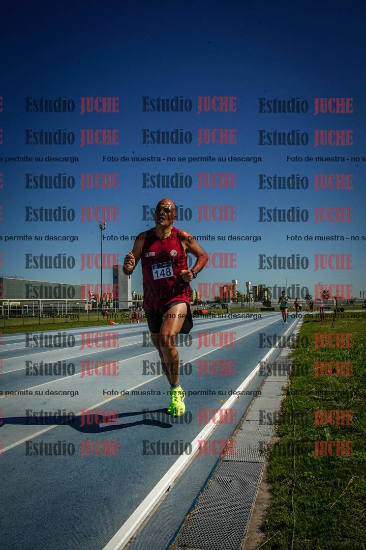 Fotos de los 5000 m de mujeres y varones - serie 2