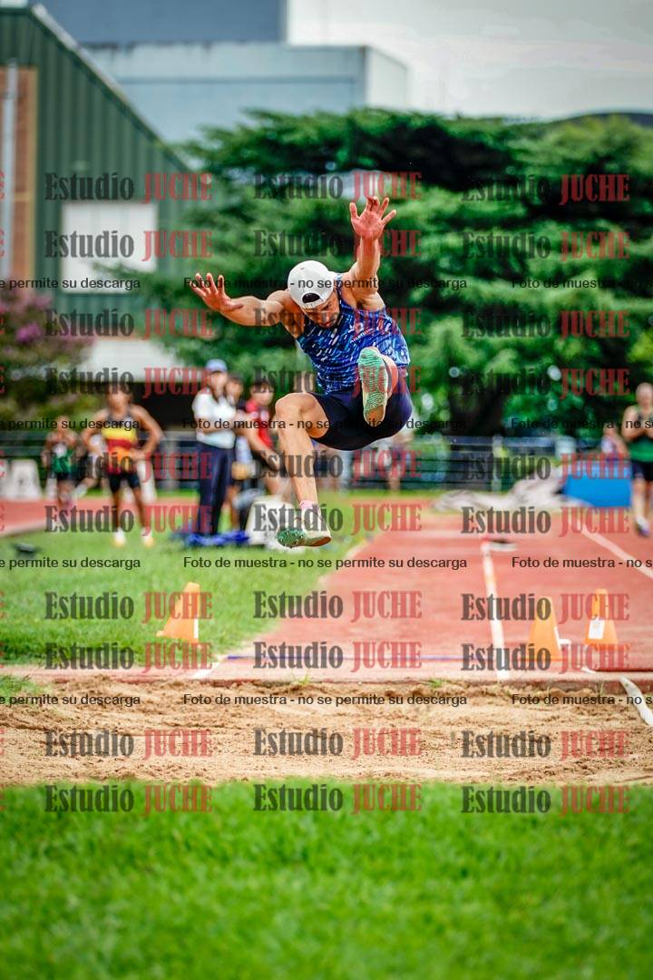 Fotos del salto en largo de varones