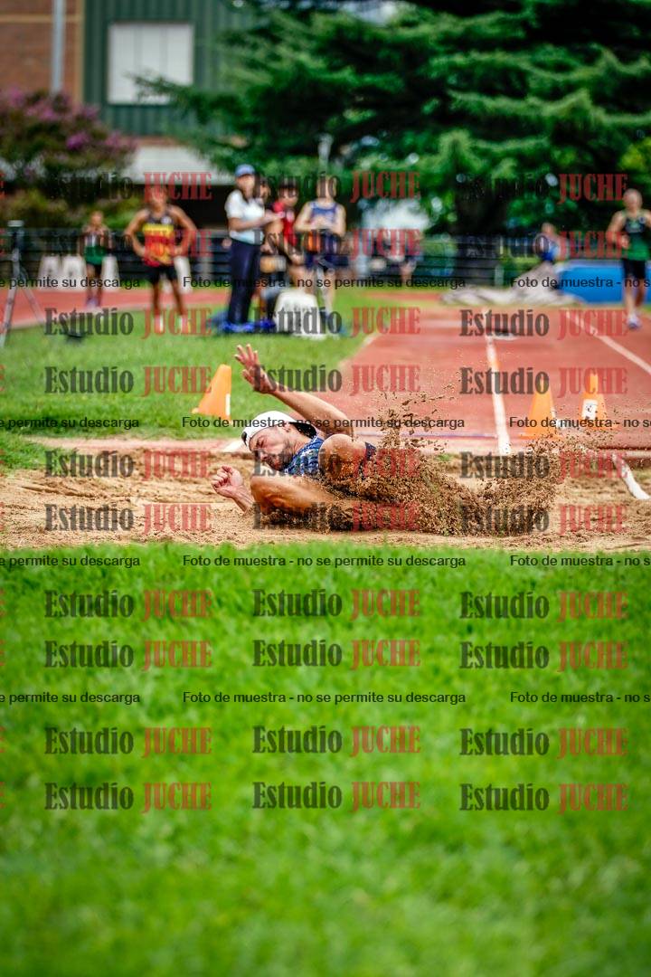 Fotos del salto en largo de varones