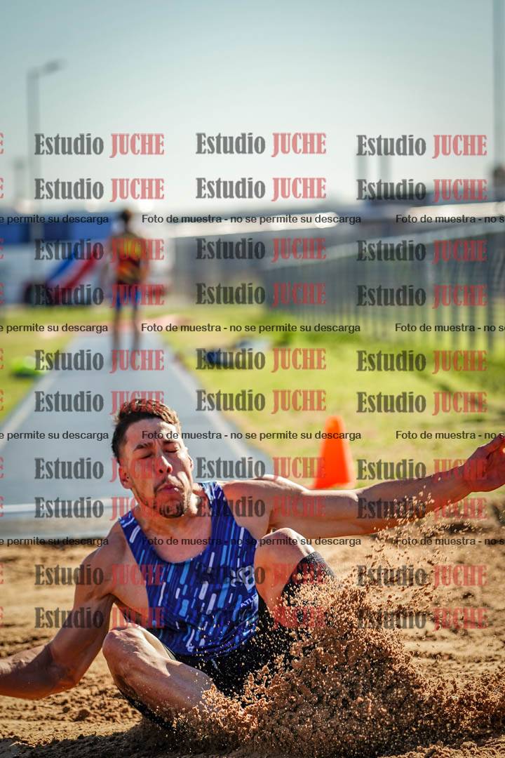 Fotos del salto en largo de varones