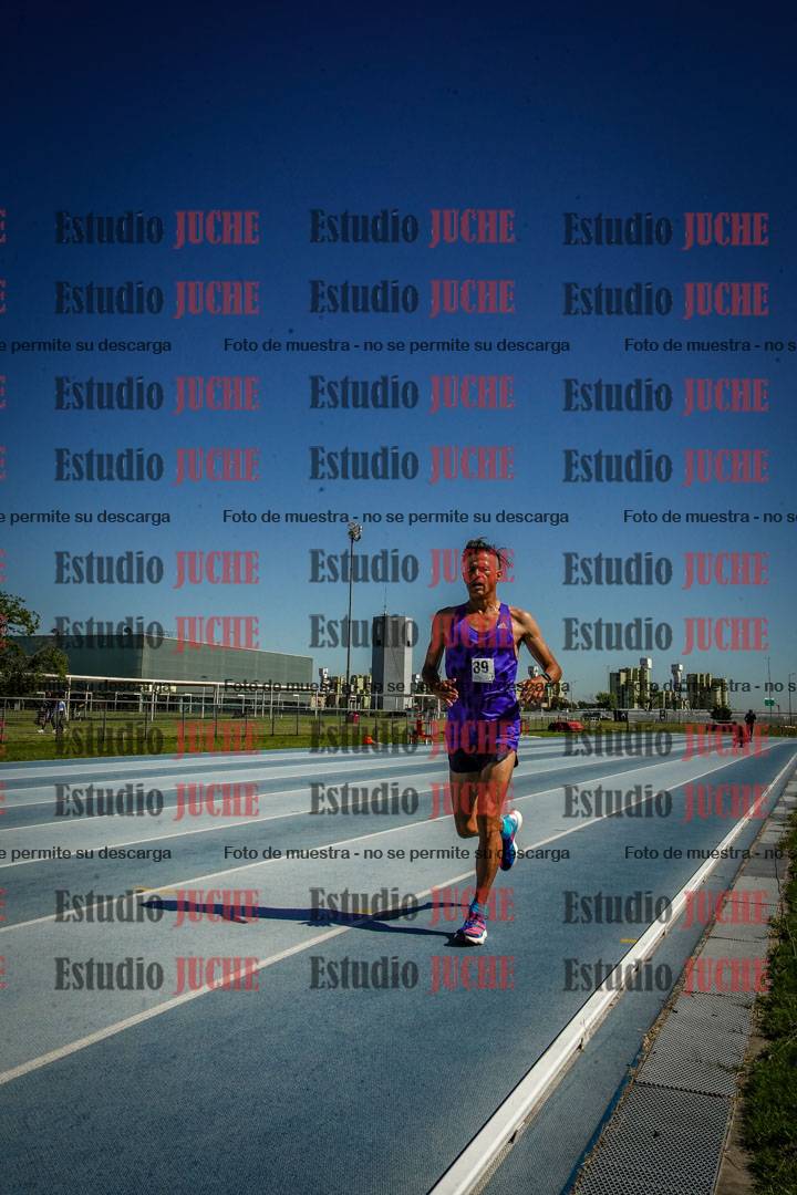 Fotos de los 5000 m de mujeres y varones - serie 2