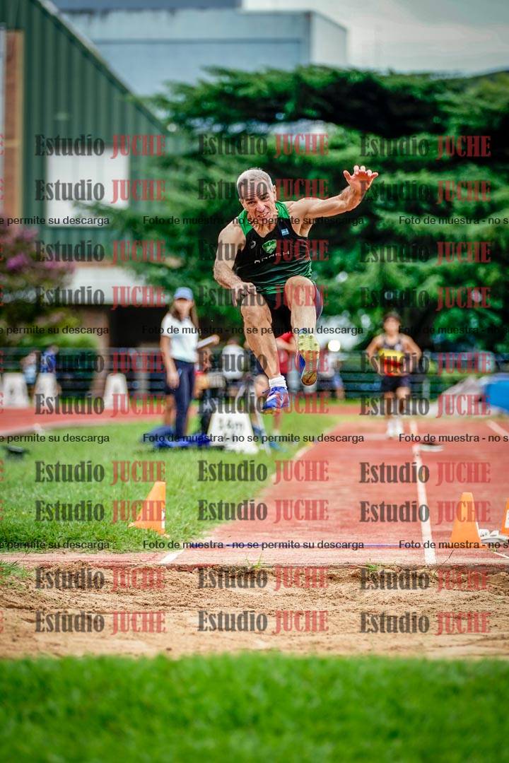 Fotos del salto en largo de varones