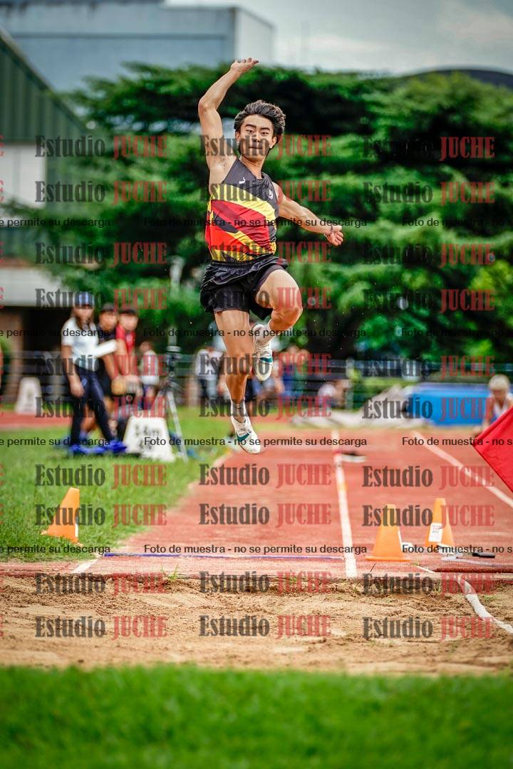 Fotos del salto en largo de varones