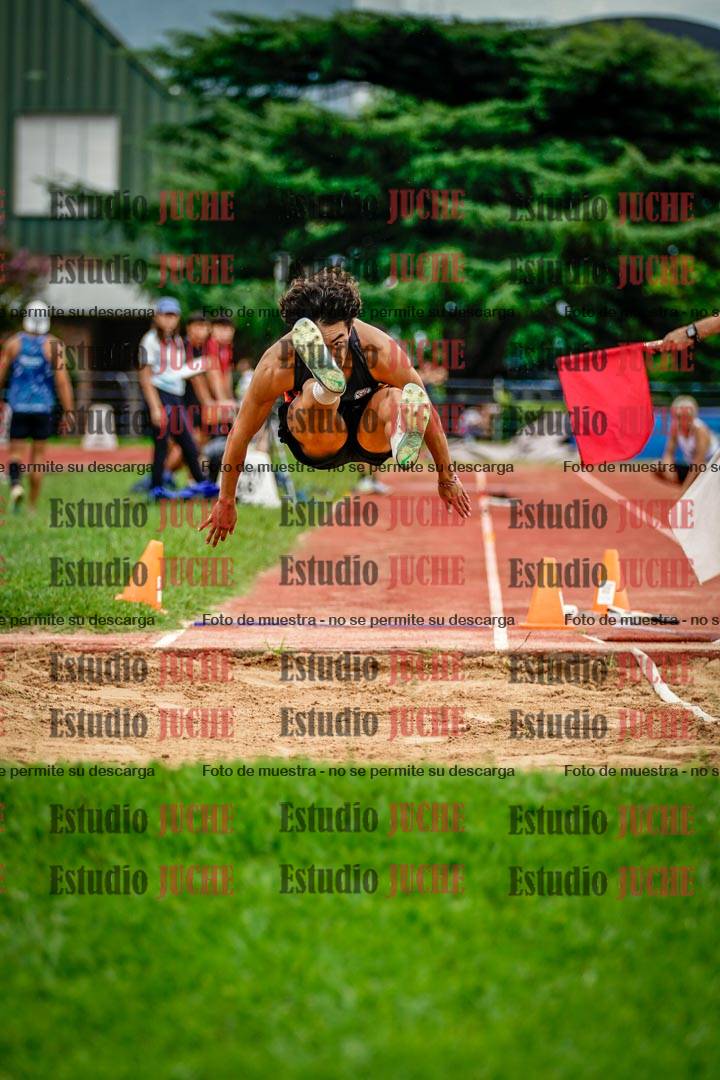 Fotos del salto en largo de varones