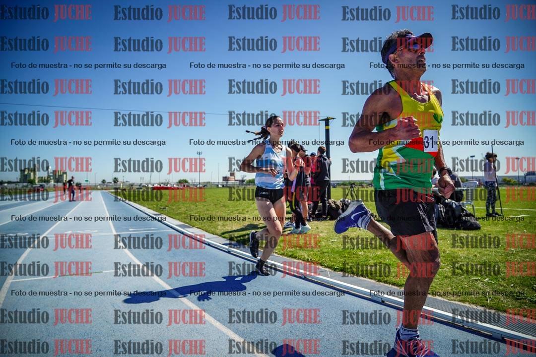 Fotos de los 5000 m de mujeres y varones - serie 2