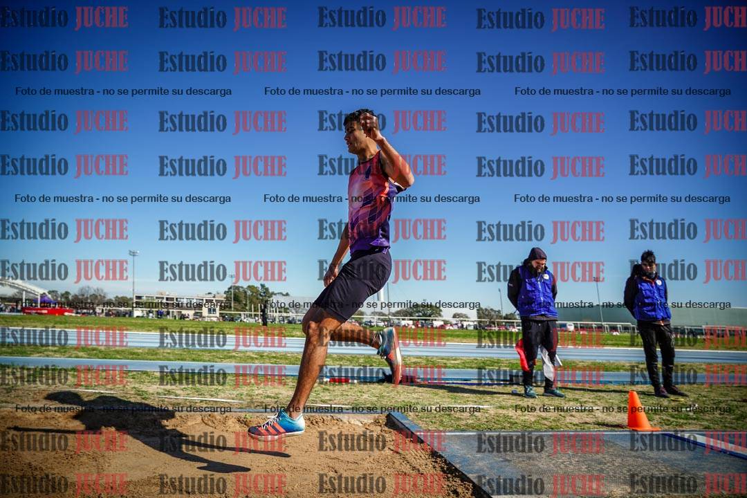 Fotos del salto en largo de varones