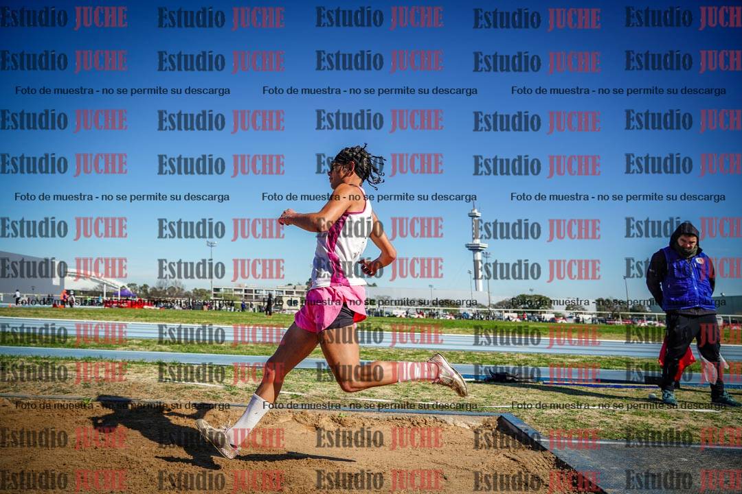 Fotos del salto en largo de varones
