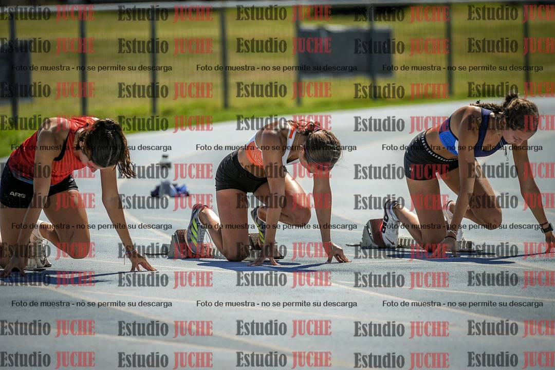 Fotos de los 100 m con vallas de mujeres - serie 1