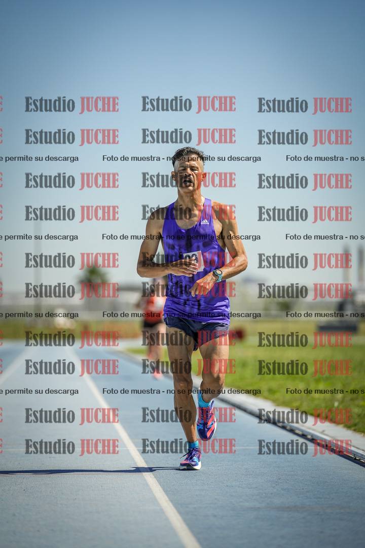 Fotos de los 5000 m de mujeres y varones - serie 2