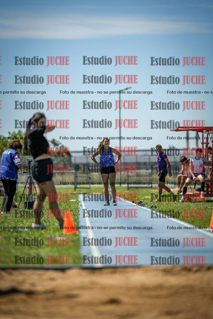 Fotos del salto triple de varones y mujeres - todas las tablas