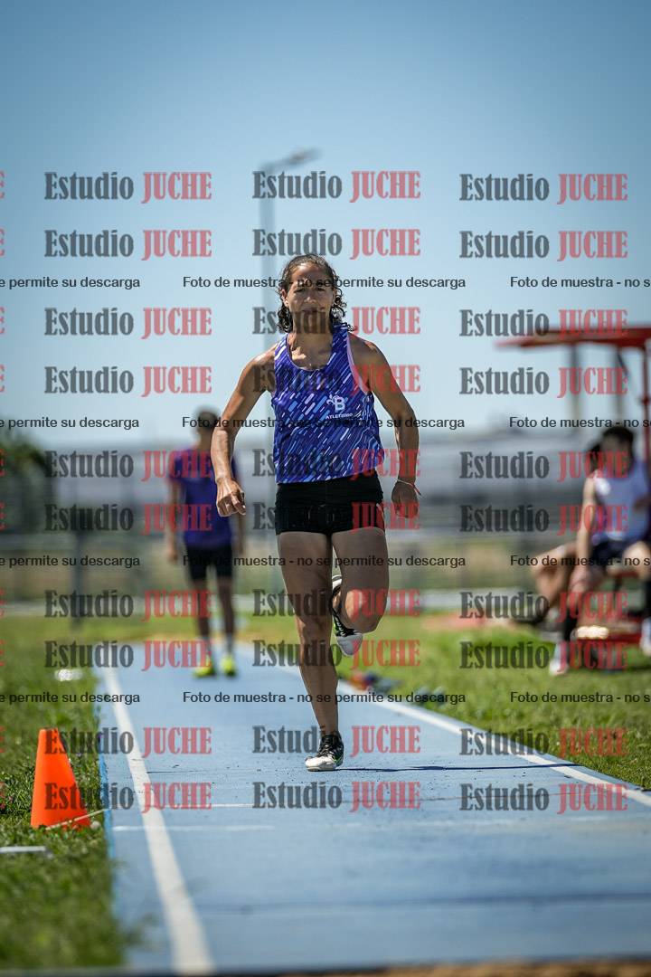 Fotos del salto triple de varones y mujeres - todas las tablas