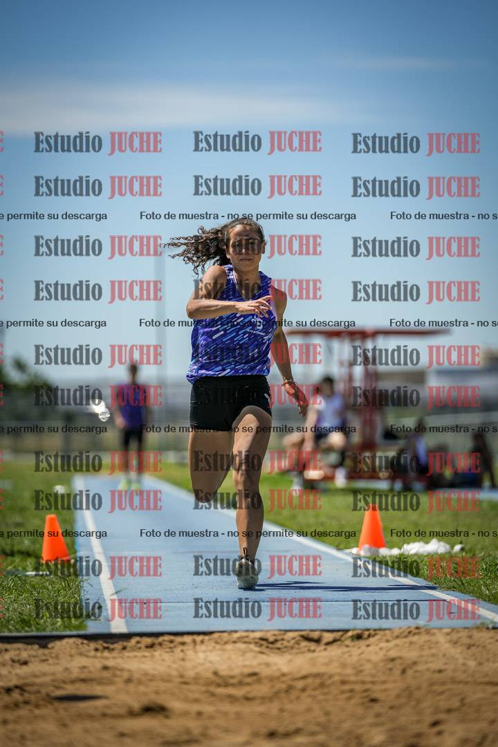 Fotos del salto triple de varones y mujeres - todas las tablas