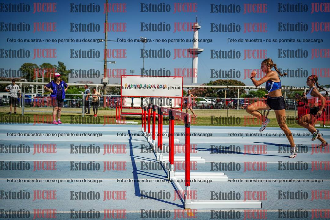 Fotos de los 100 m con vallas de mujeres - serie 1