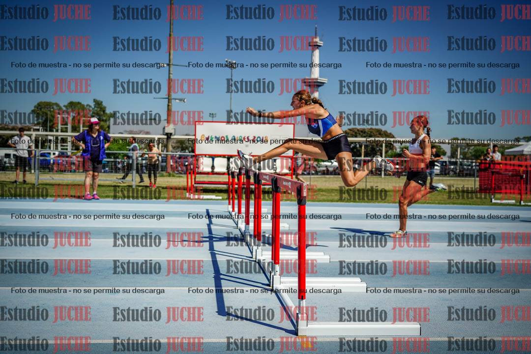 Fotos de los 100 m con vallas de mujeres - serie 1