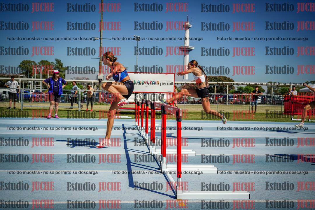 Fotos de los 100 m con vallas de mujeres - serie 1