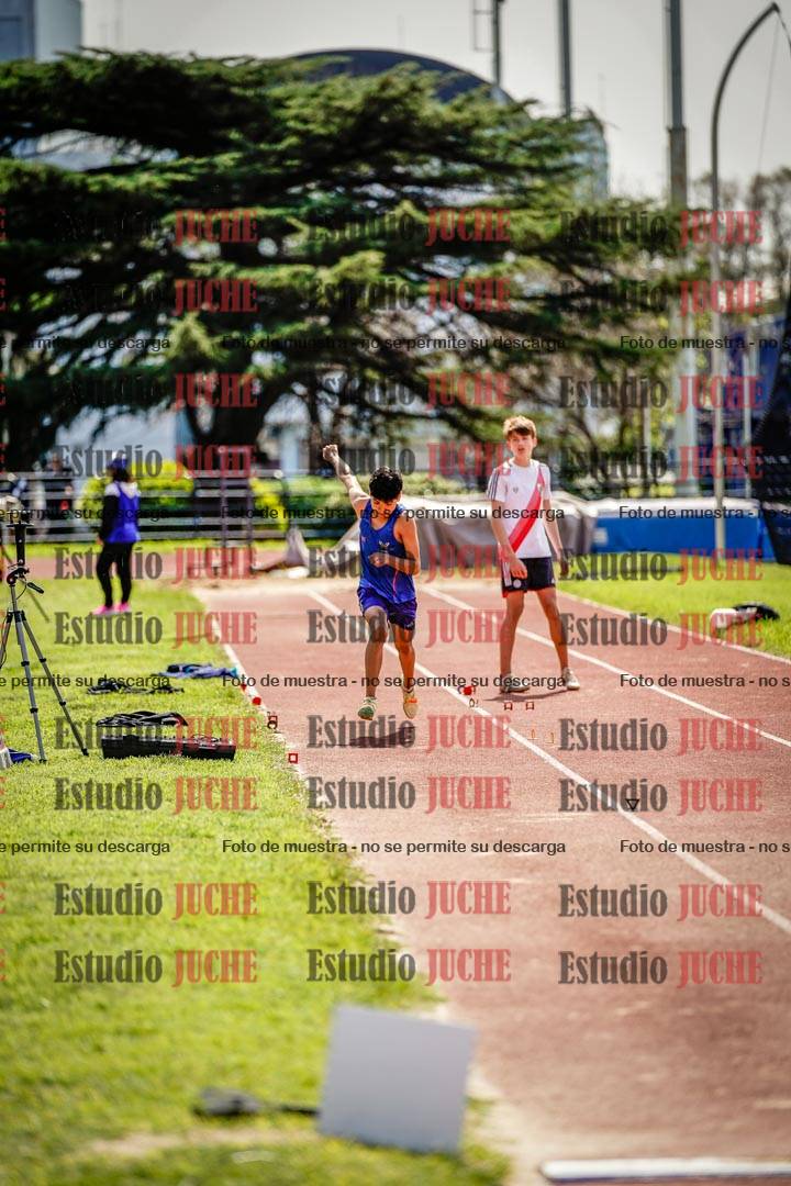 Fotos del salto en largo de varones