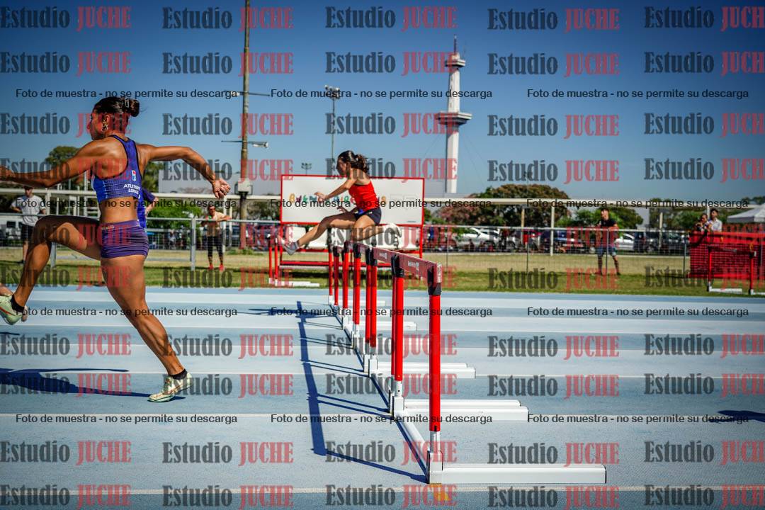 Fotos de los 100 m con vallas de mujeres - serie 1