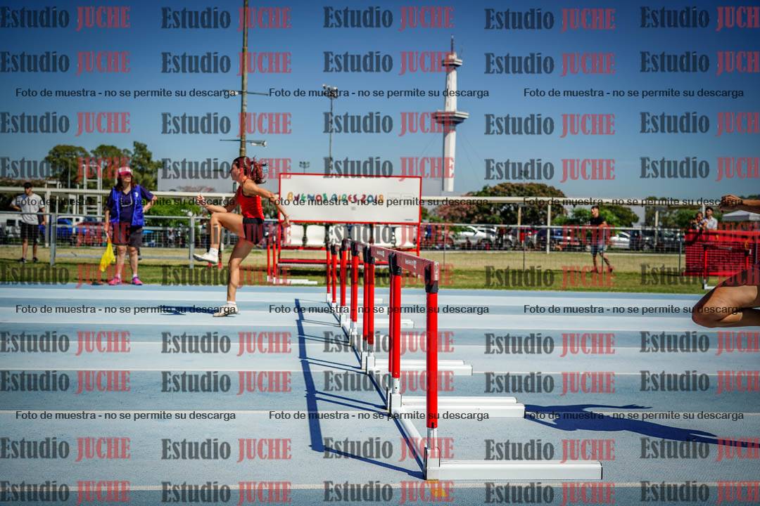 Fotos de los 100 m con vallas de mujeres - serie 1
