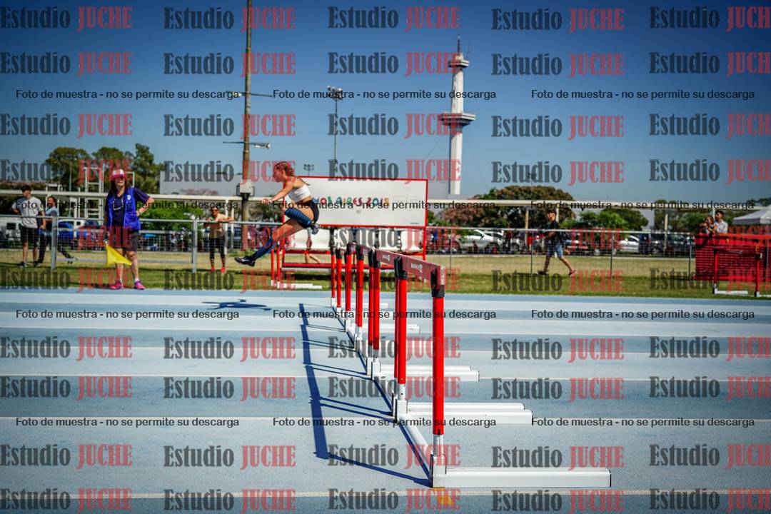 Fotos de los 100 m con vallas de mujeres - serie 1