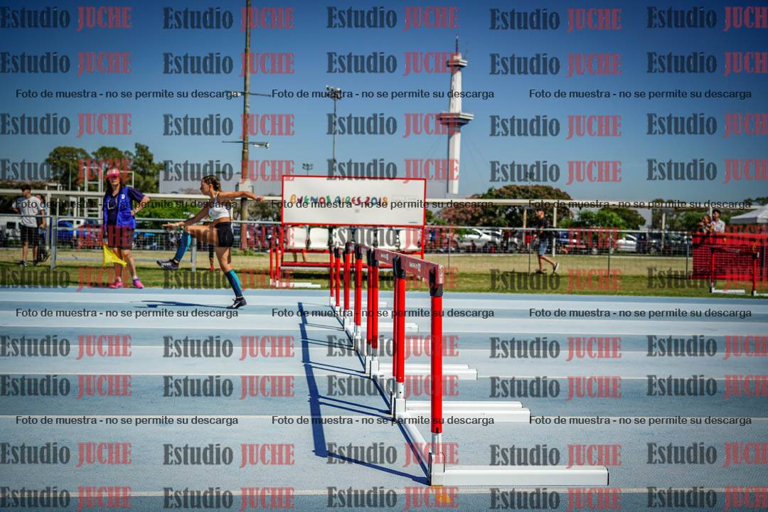 Fotos de los 100 m con vallas de mujeres - serie 1
