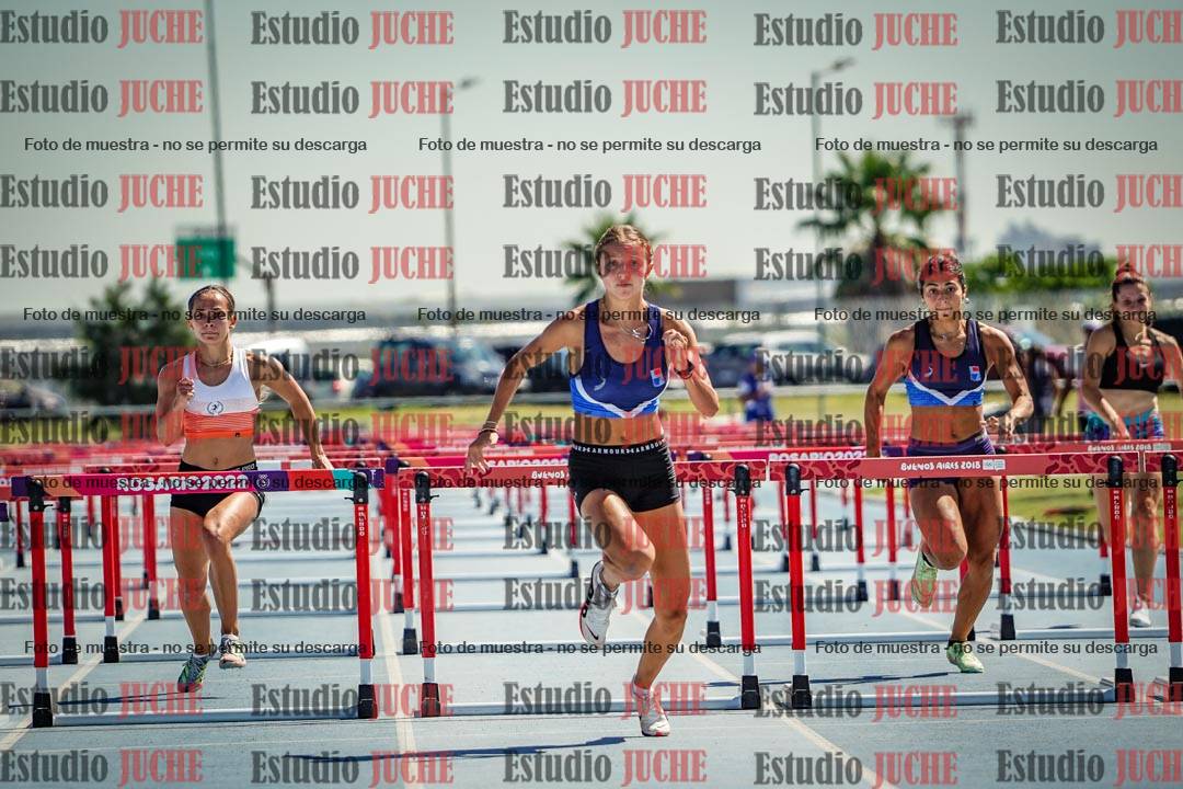 Fotos de los 100 m con vallas de mujeres - serie 1