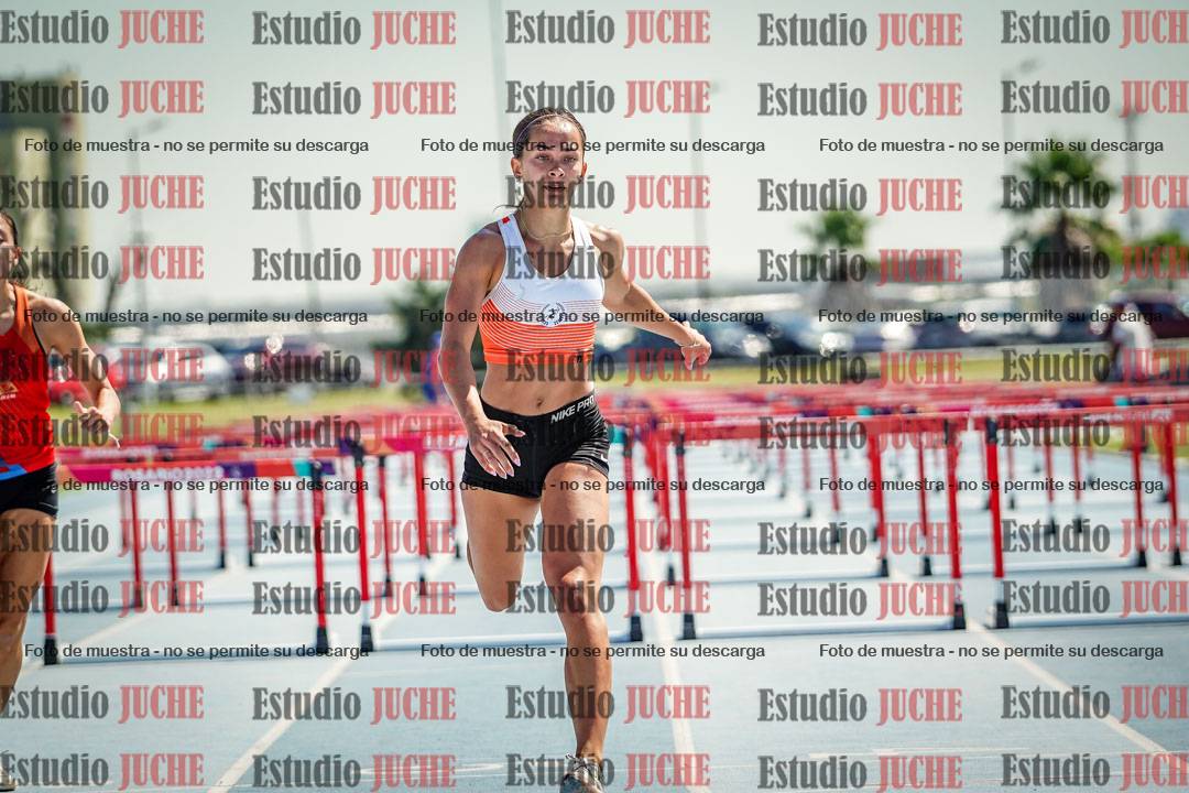 Fotos de los 100 m con vallas de mujeres - serie 1