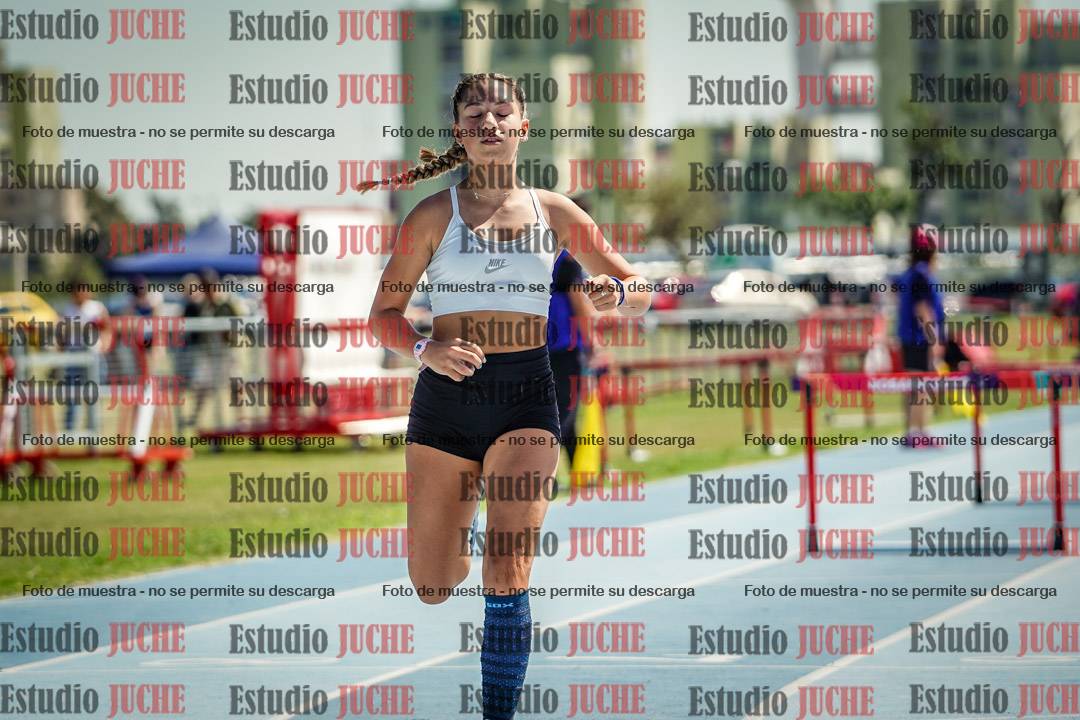 Fotos de los 100 m con vallas de mujeres - serie 1