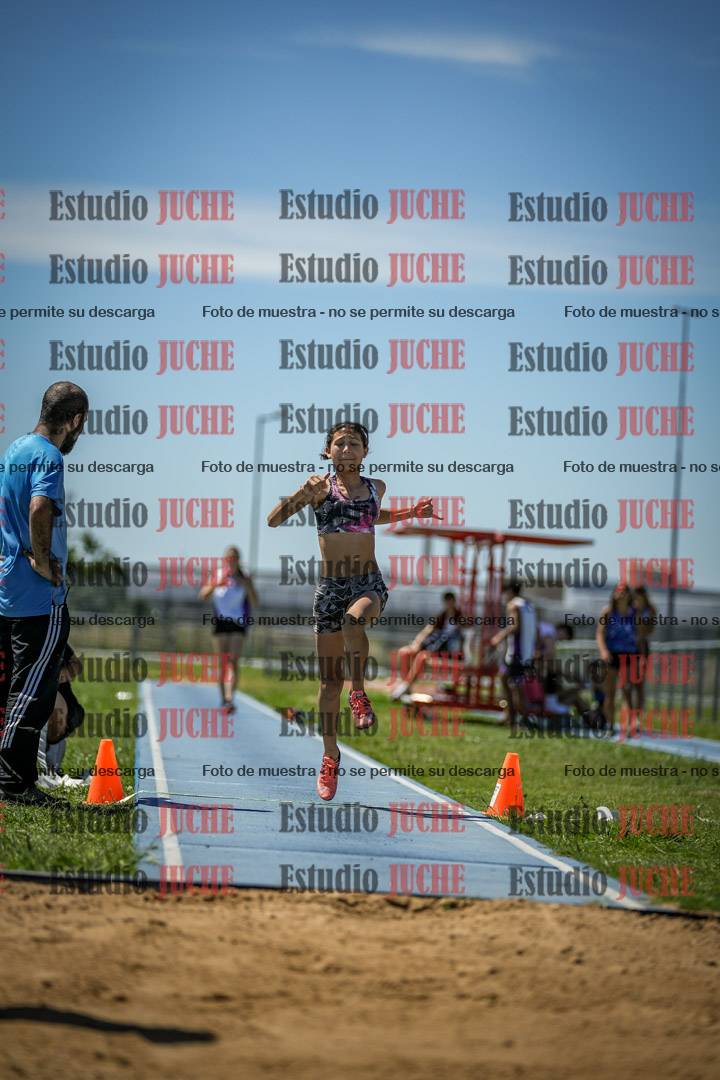 Fotos del salto triple de varones y mujeres - todas las tablas