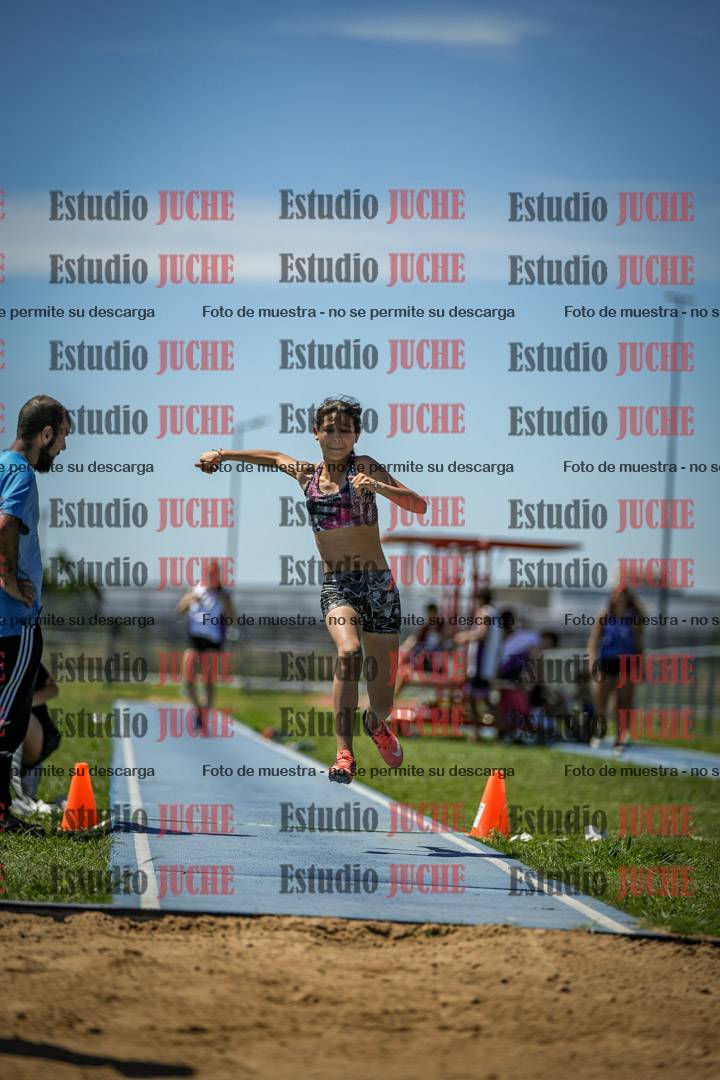 Fotos del salto triple de varones y mujeres - todas las tablas