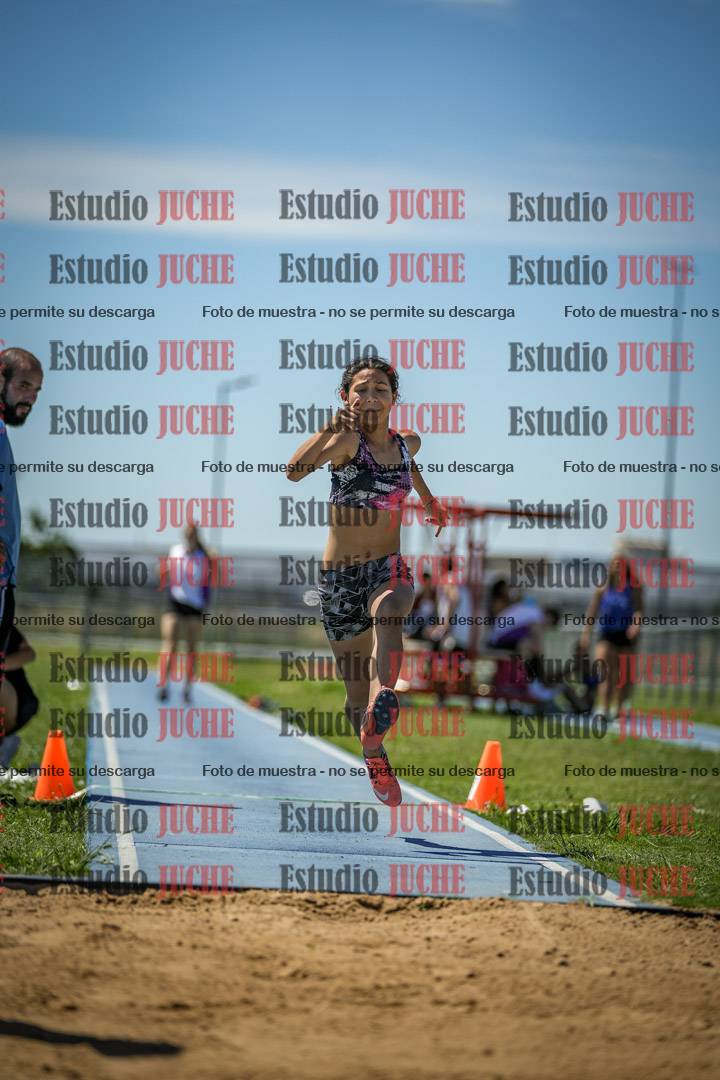 Fotos del salto triple de varones y mujeres - todas las tablas