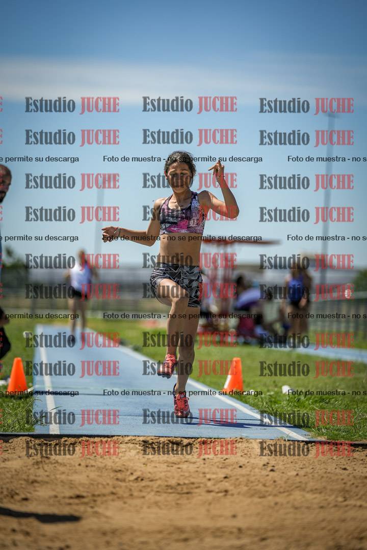 Fotos del salto triple de varones y mujeres - todas las tablas