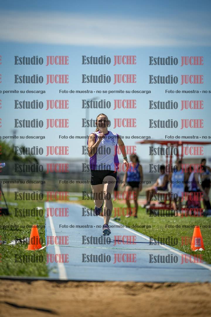 Fotos del salto triple de varones y mujeres - todas las tablas