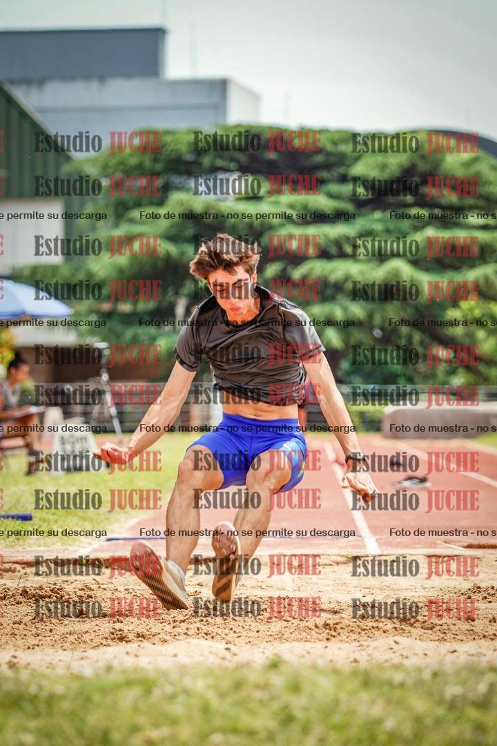 Fotos del salto en largo de varones