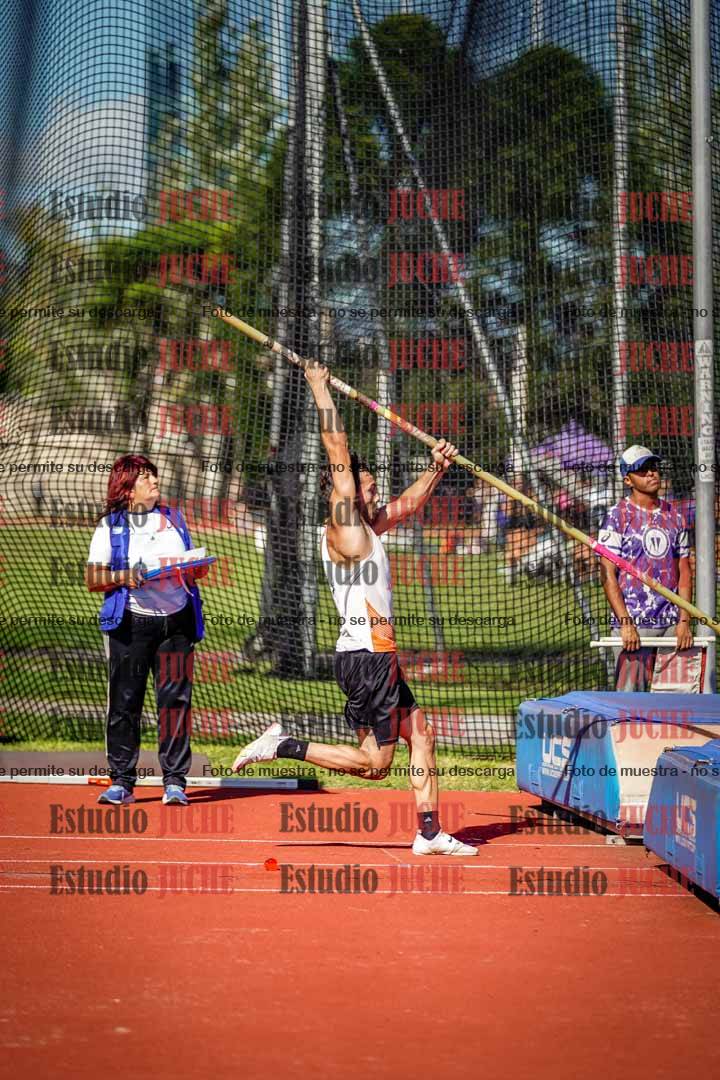 Fotos del salto triple de mujeres y varones