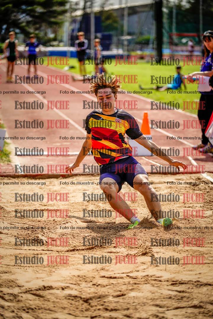 Fotos del salto en largo de varones