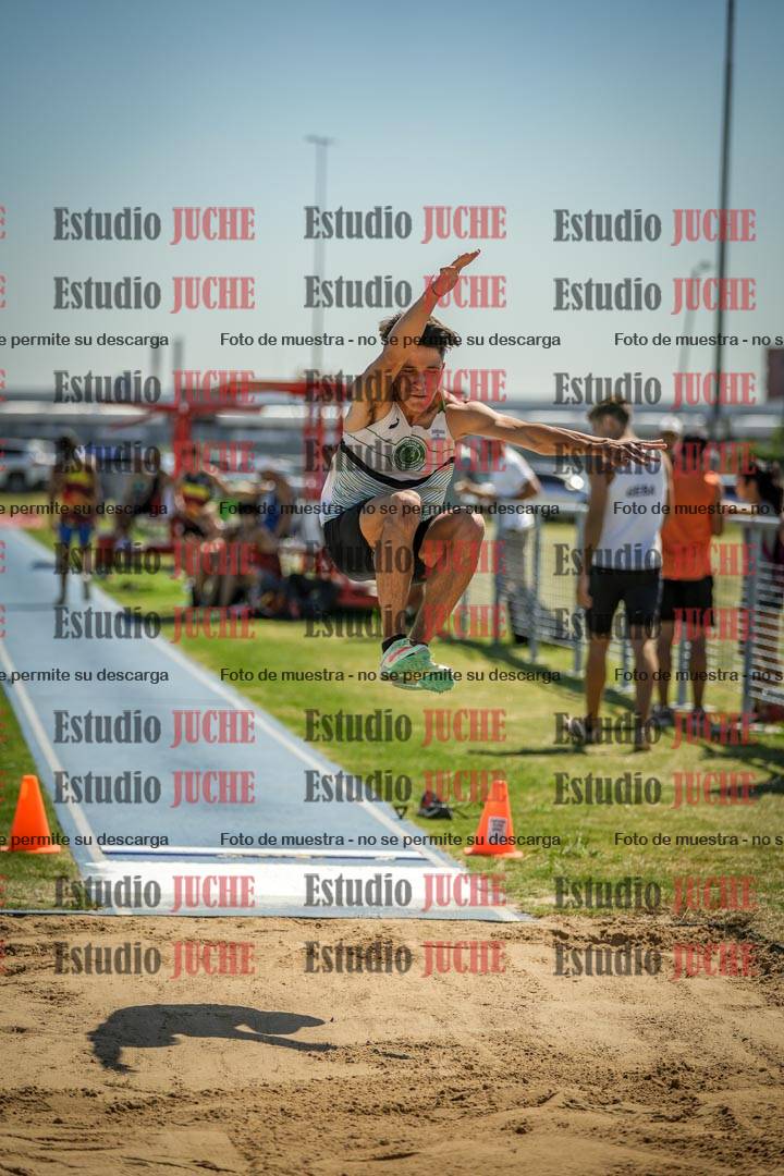 Fotos del salto en largo de varones - mayores