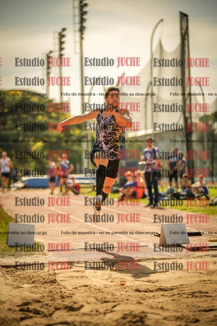 Fotos del salto en largo de varones