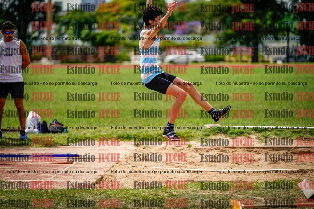 Fotos del salto en largo de varones