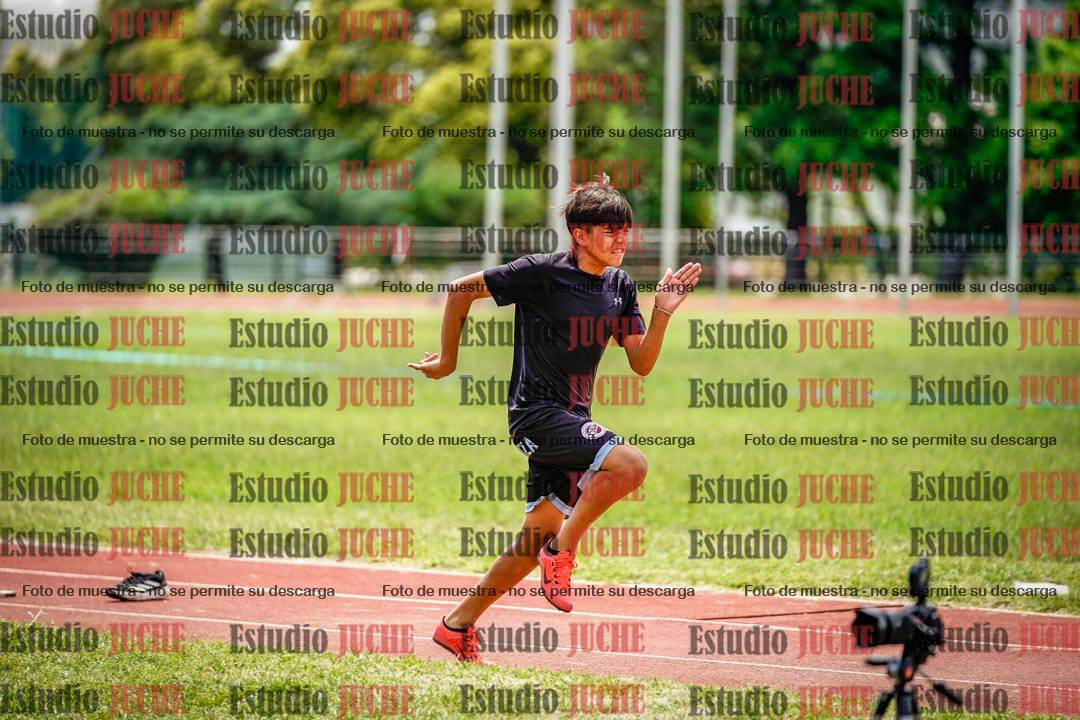 Fotos del salto en largo de varones