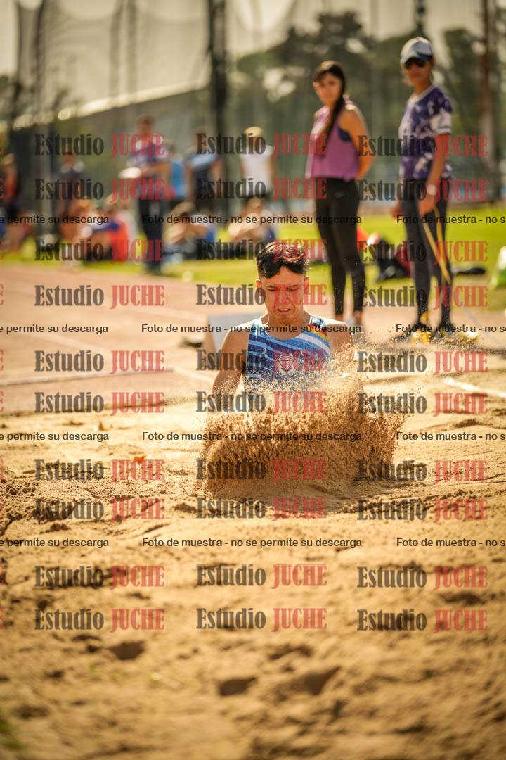 Fotos del salto en largo de varones