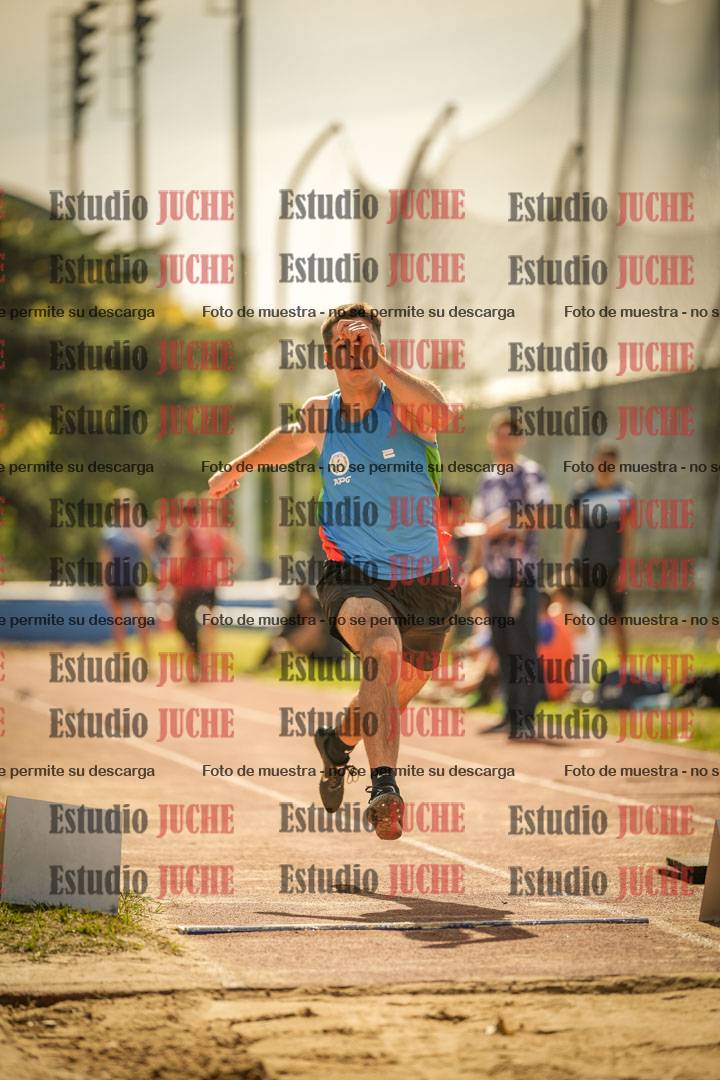 Fotos del salto en largo de varones