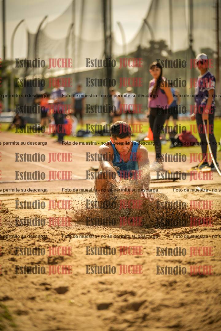 Fotos del salto en largo de varones
