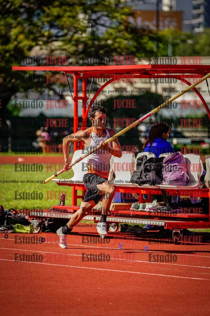 Fotos del salto triple de mujeres y varones