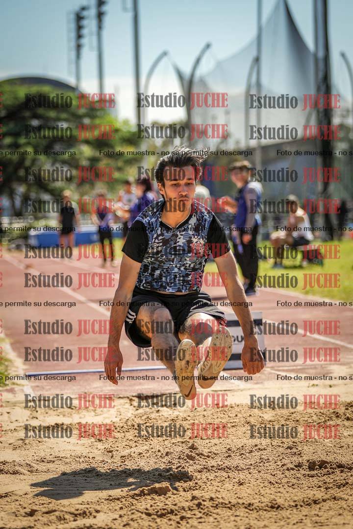 Fotos del salto en largo de varones