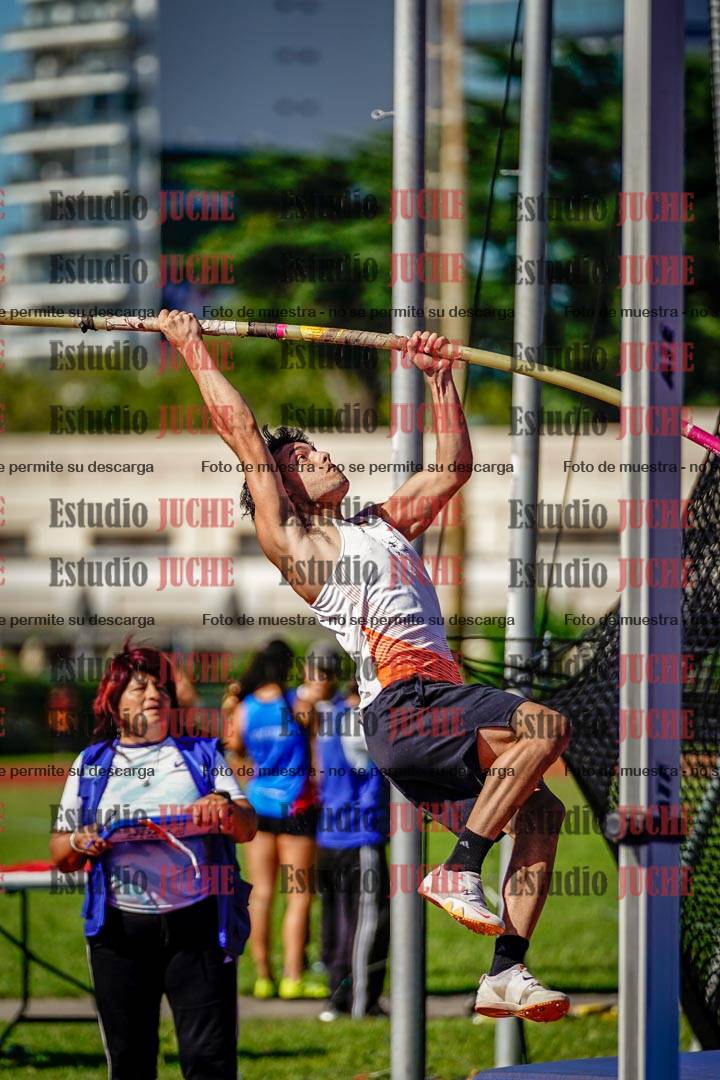 Fotos del salto triple de mujeres y varones