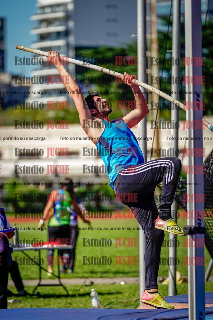 Fotos del salto triple de mujeres y varones