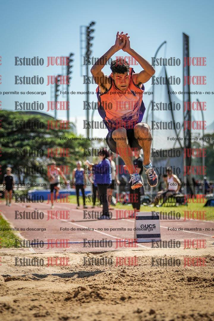 Fotos del salto en largo de varones